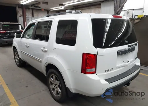 2010 Honda Pilot Touring z USA, uszkodzony, nr VIN 5FNYF4H8XAB021055